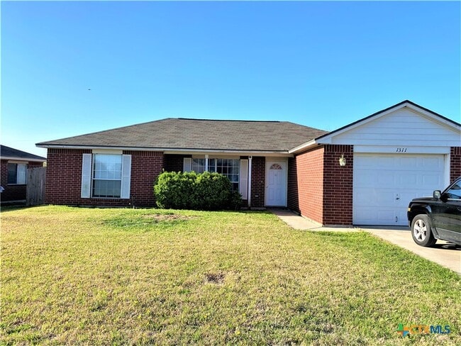 property at 1311 E Downs Ave