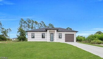 57 Xelda Ave S in Lehigh Acres, FL - Building Photo