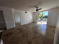 1555 N Treasure Dr, Unit # 210 in North Bay Village, FL - Building Photo - Building Photo