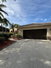 1007 Nandina Dr in Weston, FL - Building Photo - Building Photo