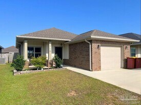 5798 Corkscrew Ct in Pace, FL - Building Photo