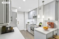 50 E 8th St in New York, NY - Building Photo - Building Photo