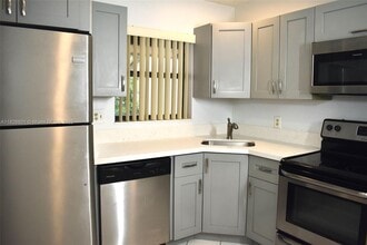 4459 Carambola Cir S in Coconut Creek, FL - Building Photo - Building Photo