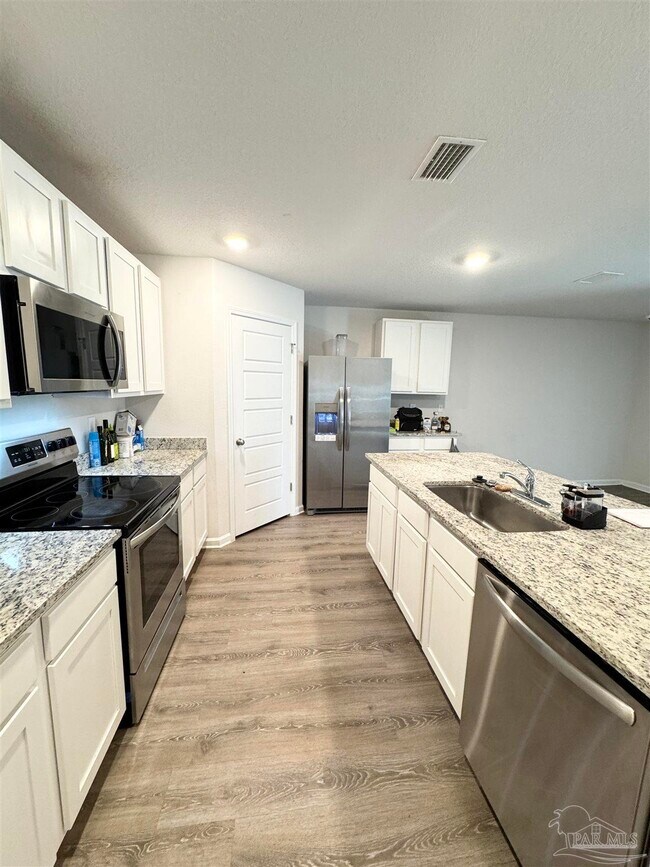 6311 Burrow Ln in Bellview, FL - Building Photo - Building Photo