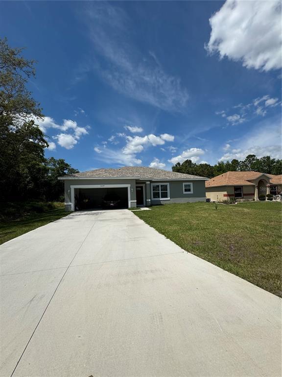 1639 Tench Ct in Kissimmee, FL - Foto de edificio - Building Photo