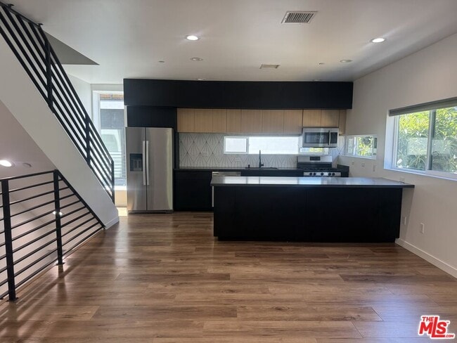 property at 5638 Woodman Ave