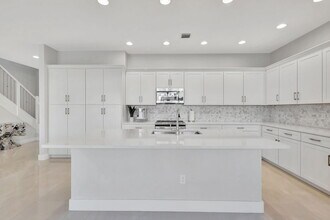 16608 Cove Rd in Westlake, FL - Building Photo - Building Photo