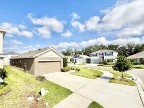 5699 Chorleywood Ln in Wesley Chapel, FL - Foto de edificio - Building Photo