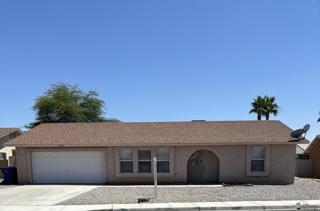 property at 11269 E 27th St