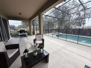 8032 Oak Shadow Ct in Davenport, FL - Building Photo - Building Photo