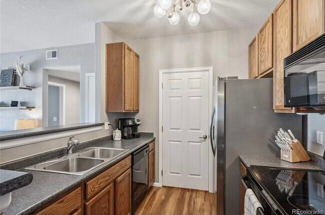 15700 E Jamison Dr, Unit #4303 in Englewood, CO - Building Photo - Building Photo