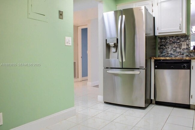 property at 7561 NW 1st St