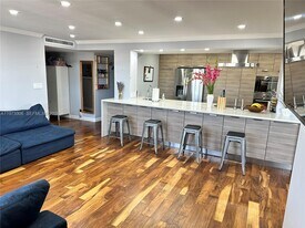 401 Golden Isles Dr in Hallandale Beach, FL - Building Photo