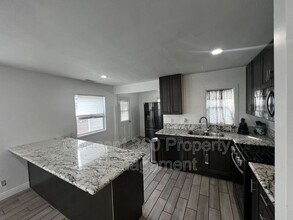 14101 1/2 Anderson Pl in Paramount, CA - Building Photo - Building Photo