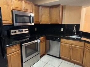 9001 Wiles Rd in Coral Springs, FL - Building Photo - Building Photo