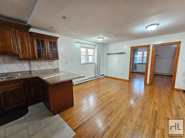 Spacious 3-Bedroom Apartment in Woodside in Queens, NY - Building Photo - Building Photo