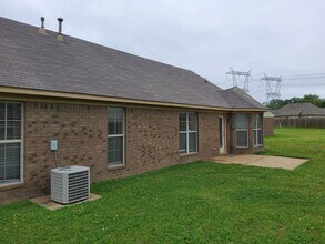 Modern Southaven Home with Two-Car Garage in Southaven, MS - Building Photo - Building Photo