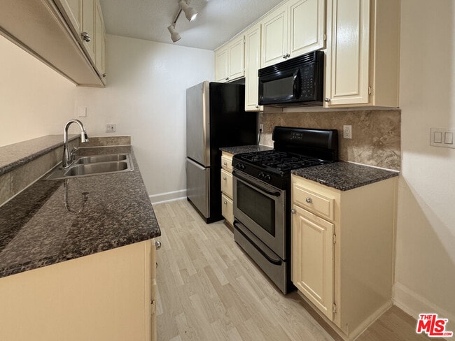 property at 7035 Woodley Ave