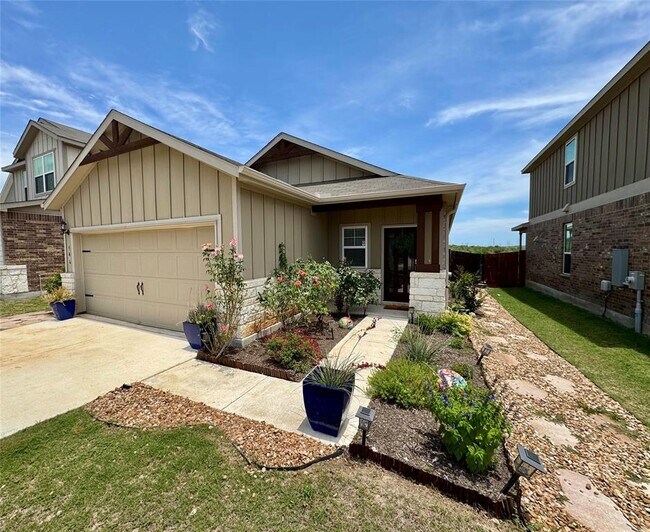 546 Pepperbark Loop in Mustang Ridge, TX - Building Photo - Building Photo