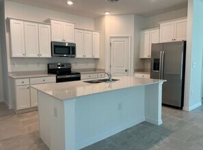 3849 Treasure Oak Wy in Ft. Myers, FL - Building Photo - Building Photo