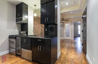 W. 128th St, 7th Ave, Unit 2 in New York, NY - Building Photo