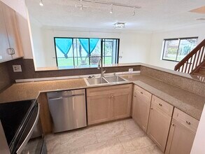 1635 Woodbridge Lakes Cir in West Palm Beach, FL - Building Photo - Building Photo