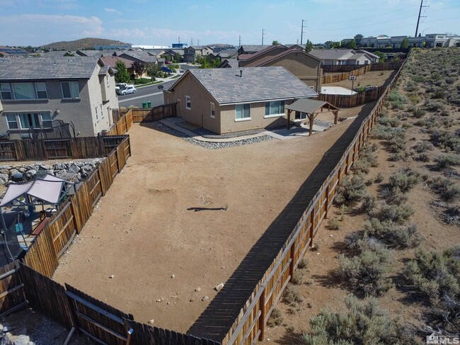 7161 Mustengo Dr in Reno, NV - Building Photo - Building Photo