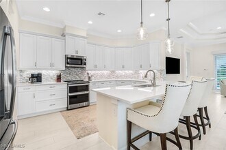5778 Highbourne Dr in Naples, FL - Building Photo - Building Photo