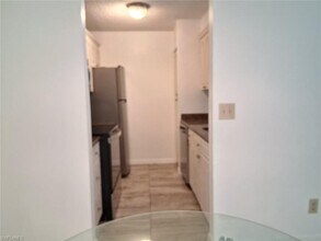 108 Santa Clara Dr, Unit 11 in Naples, FL - Foto de edificio - Building Photo