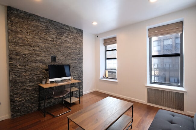 property at 318 W 36th St.