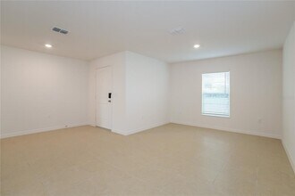 1661 Hideaway Flat St in Mascotte, FL - Building Photo - Building Photo