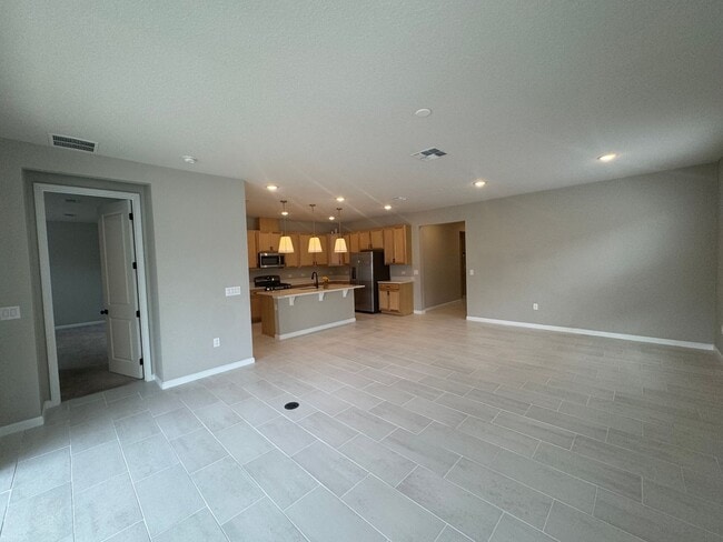 5089 Meadow Song Dr in Okahumpka, FL - Building Photo - Building Photo