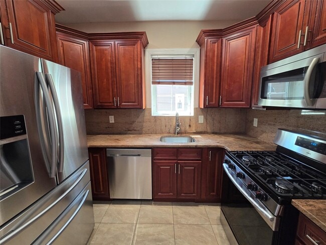 property at 120-32 201st St