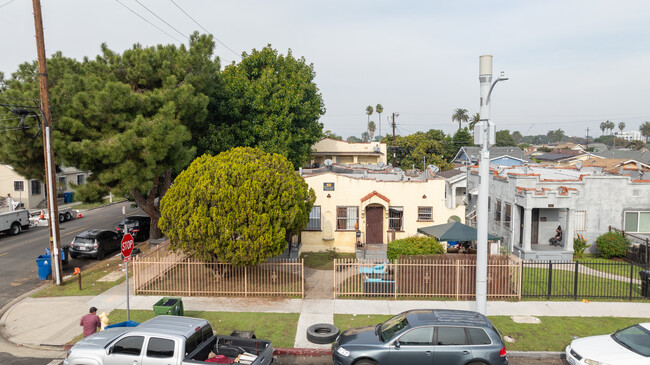 1557-1559 1/2 W 52nd St in Los Angeles, CA - Building Photo - Building Photo