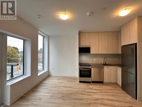 7439 Kingston Rd in Toronto, ON - Building Photo - Building Photo