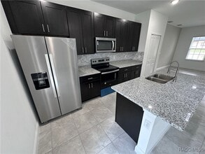 7145 N Heritage Dr in Citrus Springs, FL - Building Photo - Building Photo