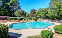 Swimming Pool with sundeck - Dunwoody Village Apartment Homes in Atlanta, Georgia