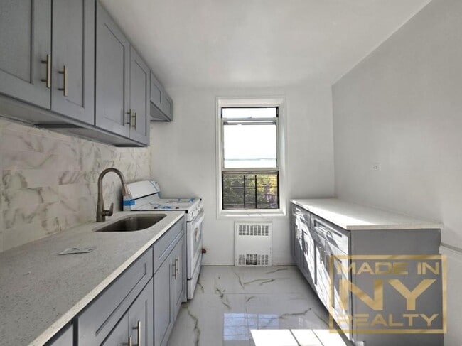 property at 65-10 108th St