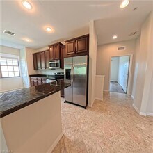 3772 Pino Vista Way in Estero, FL - Building Photo - Building Photo