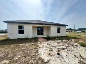 2115 NW 24th Pl in Cape Coral, FL - Building Photo - Building Photo