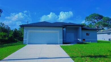 927 Bolivia Dr in Lehigh Acres, FL - Building Photo - Building Photo