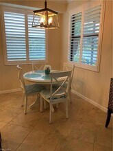 9495 Napoli Ln, Unit 101 in Naples, FL - Building Photo - Building Photo