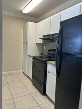 6955 NW 186th St, Unit F505 in Hialeah, FL - Building Photo - Building Photo