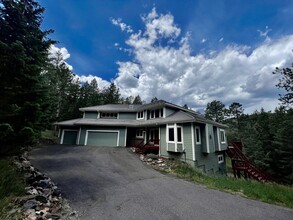 31957 Buffalo Park Rd in Evergreen, CO - Foto de edificio - Building Photo