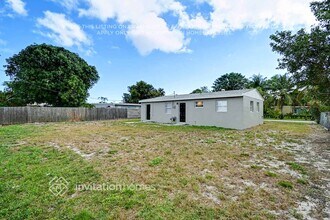 415 Cheyenne Dr in Atlantis, FL - Building Photo - Building Photo