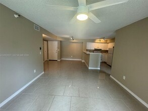 111 Yacht Club Way, Unit 107 in Hypoluxo, FL - Building Photo - Building Photo