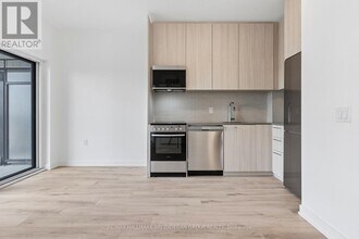 7437 Kingston Rd in Toronto, ON - Building Photo - Building Photo