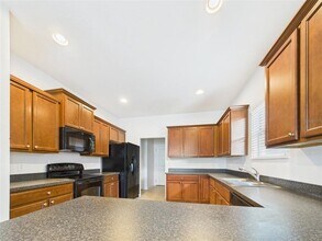 14211 Edinburgh Moor Dr in Wimauma, FL - Building Photo - Building Photo