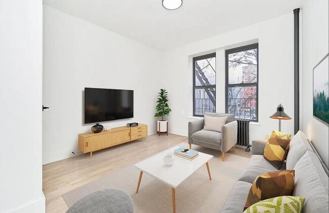property at 208 E 6th St