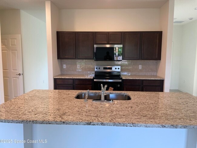 972 Toluca St SE in Palm Bay, FL - Building Photo - Building Photo
